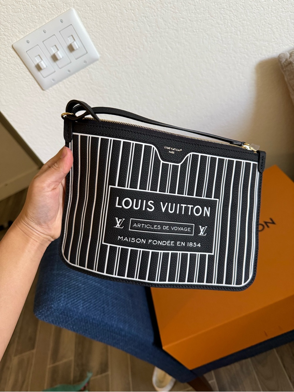 Louis Vuitton Black and White Stripe Wristlet with Gold Hardware - Picture 7 of 7